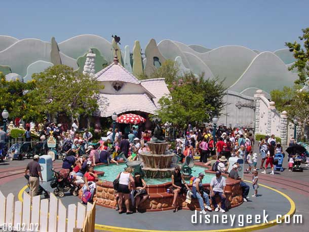 Taken - 2:23pm - Toontown Fountain with Minnie's house in back.