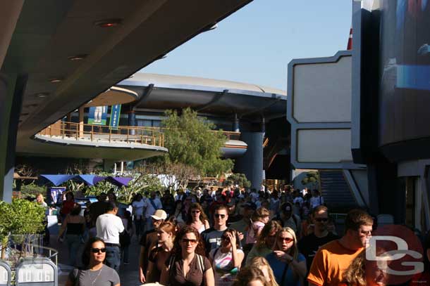 Taken - 2:24pm - Quite a few guests roaming around Tomorrowland