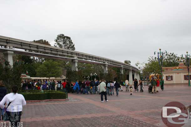 Taken - 1:58pm - The line stretched out past the monorail track (but this was off since only 4 gates were open this afternoon)