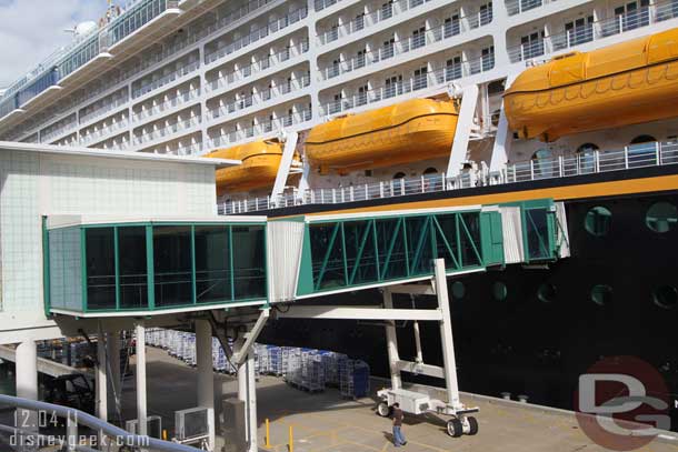 The gangway to board is basically a jetway like you see at airports now a days except it was lined with windows and much wider..