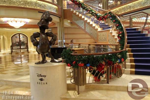Donald stands in the center of the lobby.
