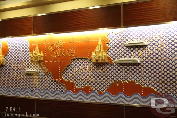 The mural behind the guest services counter.