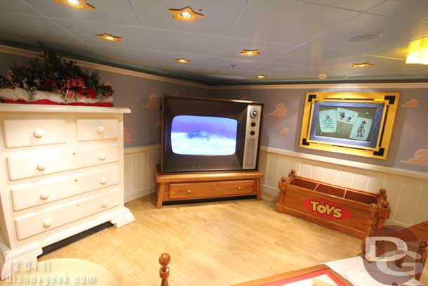 The large TV (as well as other screens throughout the space had Disney films playing).