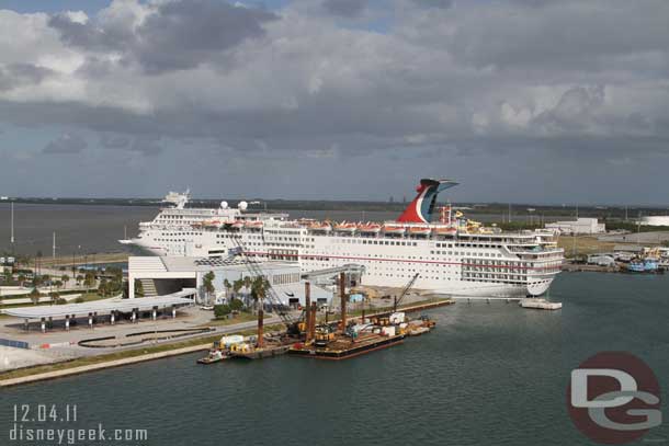 Off to the side a Carnival ship getting ready to depart too.