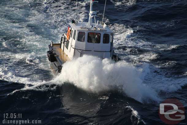 As the small boat approached us it had to go through some rough seas.