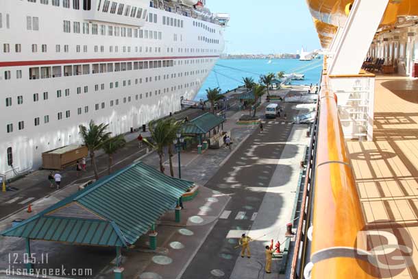 The view from Deck 4.  You can see them cleaning the ship.  In the distance you can see the gangways to go ashore.