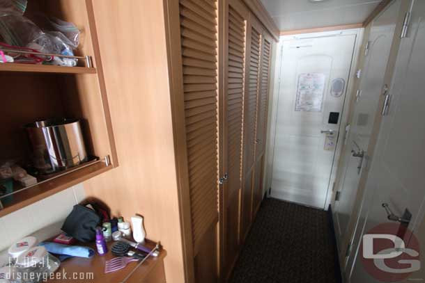 First door is the shower, second the sink/toilet, then the far door is to leave the stateroom.  On the left two closets.