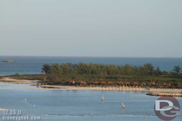 The cabanas out in the distance and beyond those far trees serenity bay.