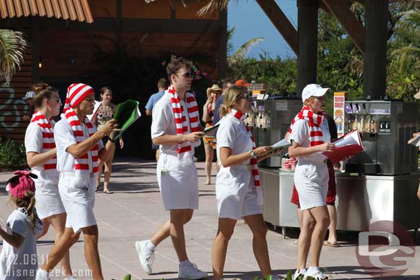 A group of Cast Members spreading holiday cheer.