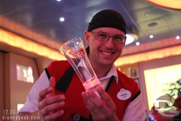 Patrick our assistant server modeling one of the pirate glasses you could purchase this evening.