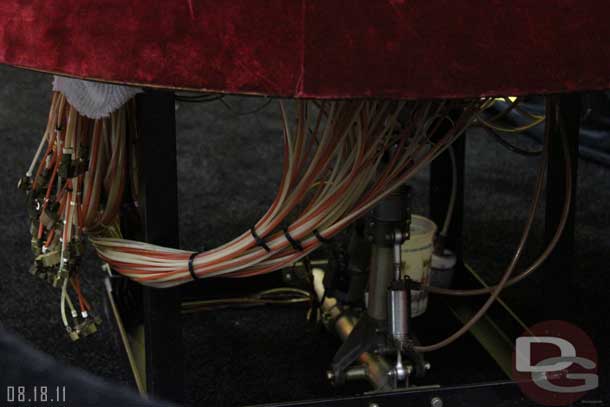 The cables/tubes for his controls were still under the table.