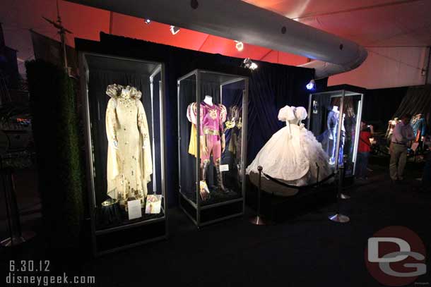 The other side had some Enchanted costumes (the three on the right) and the first one is from the Fairy Godmother in the 1997 ABC TV movie worn by Whitney Houston.