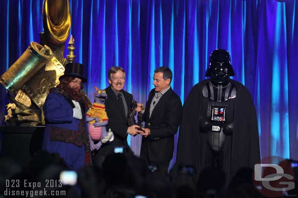 Tony receiving his award.