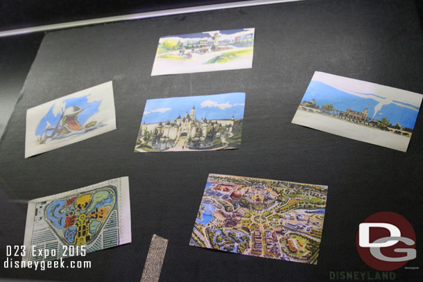 A display case with vintage post cards