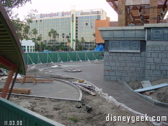 A look back at the pavement you saw them pouring in our last Disneyland update. You now walk on the new walkway. They have moved the construction wall.