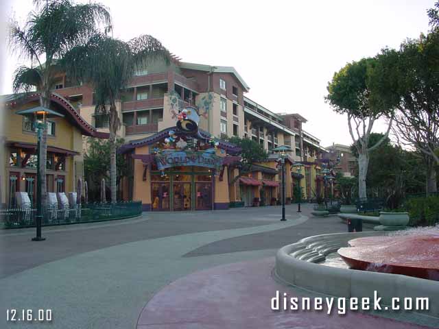 Looking through the construction fence down the main Downtown Disney walkway.