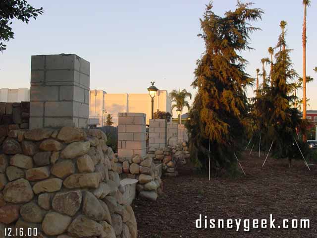 The parking lot wall is going up.