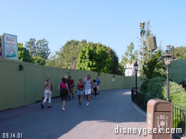 Alice and the Tea Cups are both behind the walls. 