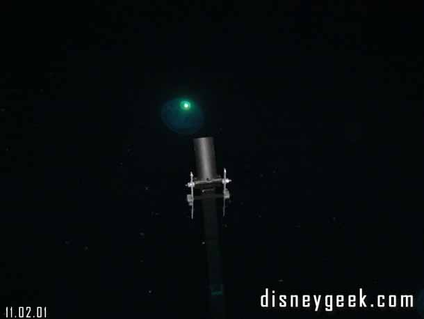 This is an interesting picture. The small cylinder in the foreground is a fireworks launcher (or at least that is our guess). The light in the top is a candle that was illuminated (under the water). There were several turned on around the lagoon, all below the surface.