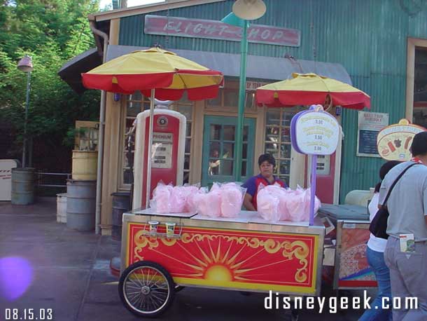 I would imagine some Imagineer somewhere might be crying over this..  the great Gas Station facade and props covered by a ODV cotton candy vendor... ahhhh 