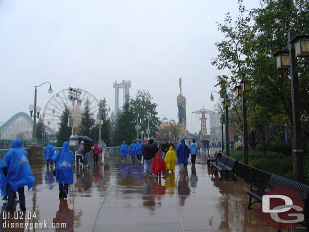 Walking up the DCA performance corridor toward the float which was parked near Golden Dreams.