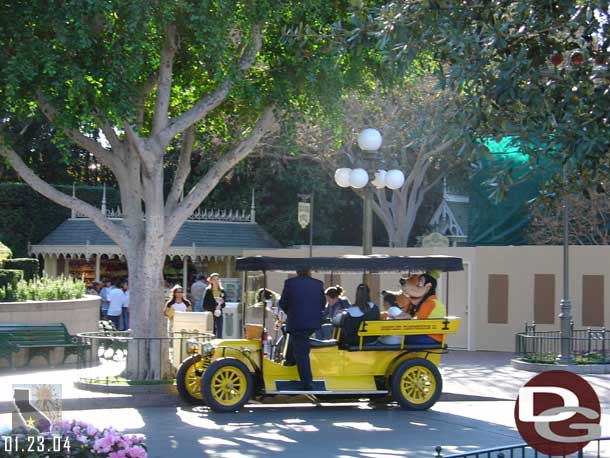 Goofy and Pluto arrive via car..