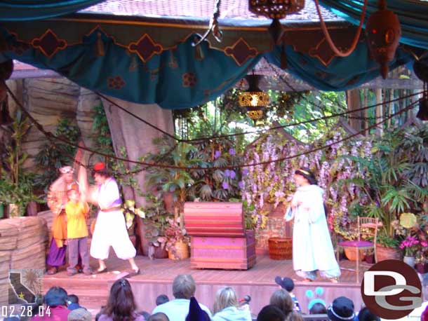 A blurry shot of the Aladdin show in adventureland