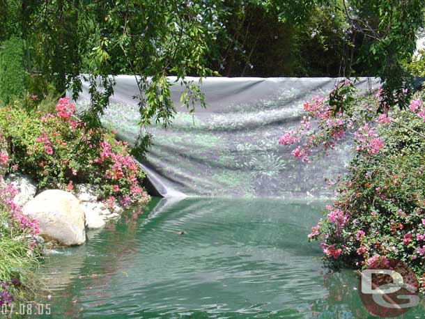 Painted tarps now block the drained portion of the lagoon from view