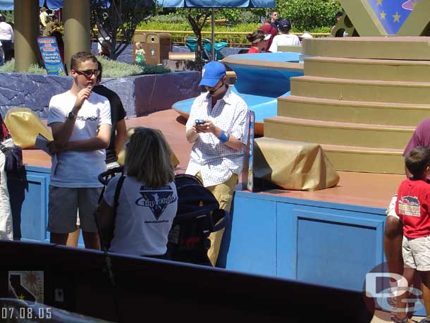 A DJ working the crowd, well really playing with his Ipod it appeared