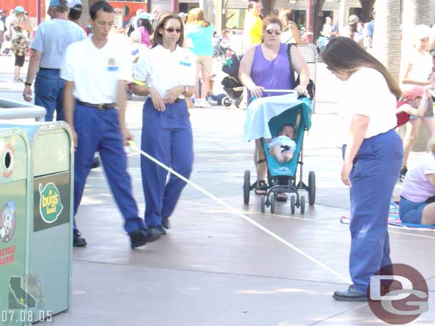 Still strikes me as weird that they did not put curbs or something to help crowds line up for the parade in this new park, instead CMs must put down and then clean up tape every day, seems extremely ineffecient and not cost effective..