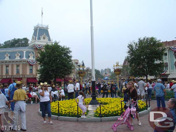 Looking down Main Street USA, we paused for a moment by the flag pole..