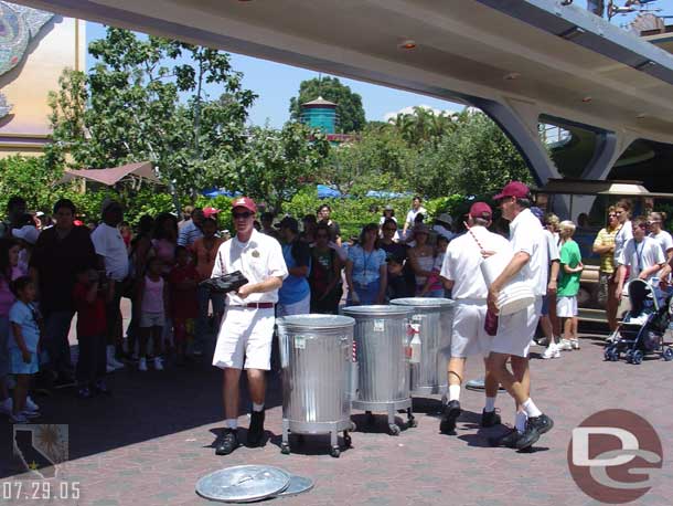 The Trashcan Trio hanging out in Tomorrowland.