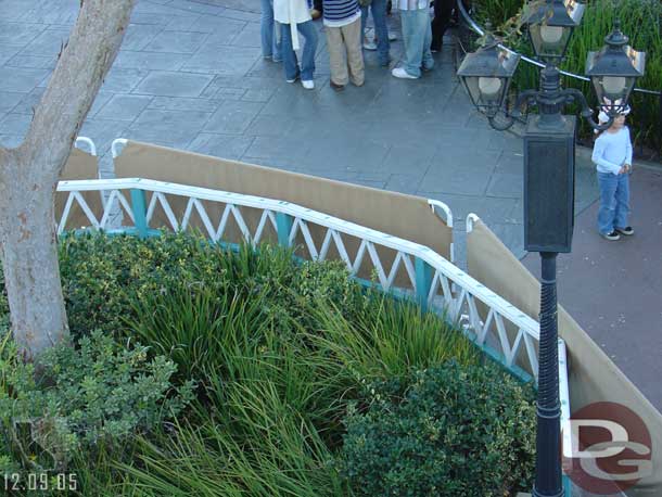 Painting work on the railings near the dock in Frontierland