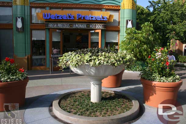 The random walls in Downtown Disney are down and the old fountain is now a planter