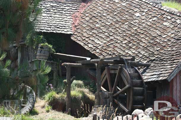 Out by Splash Mountain the water wheel is now replaced and working.