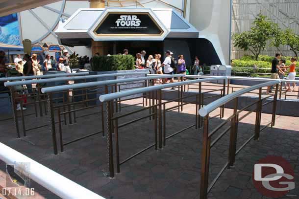 I had not noticed this before but the tops of the Astro-orbitor queue railings are now blue to better blend with the area, they used to be gold like the bottoms