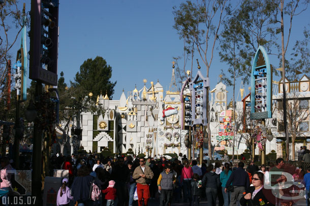 Quite a few people looking toward Small World