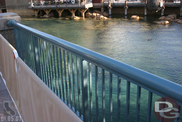 Painting the rails along the Wharf