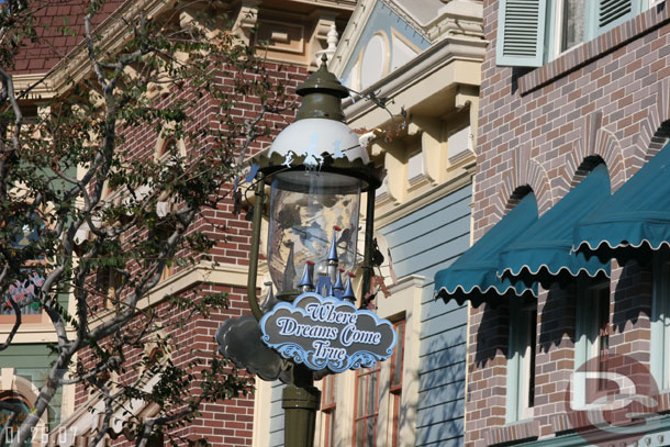 The lamp posts along Main Street are green again and now new signs have appeared on them.