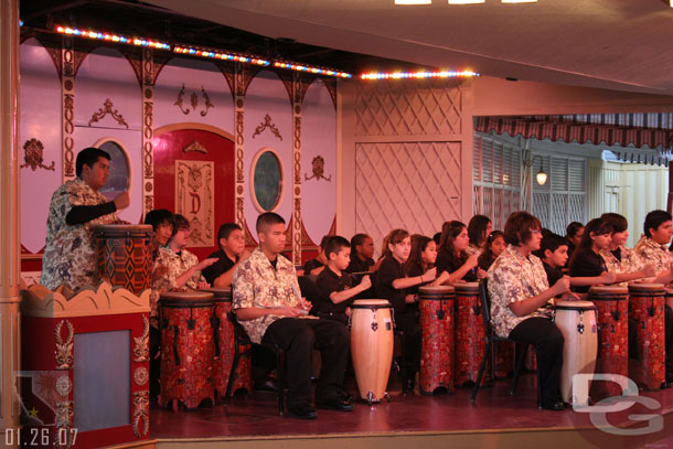 A steel drum band at Plaza Gardens