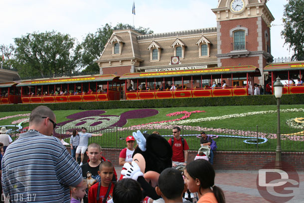 Minnie hanging out in front of the now open Disneyland Railroad