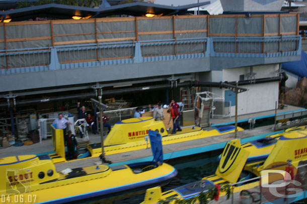 There were nearly a dozen people on the sub dock and they all got in that sub and it started to pull out (that is all I could see before the monorail trip ended)