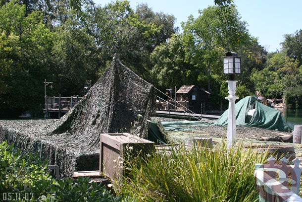 A barge of some type is docked in Frontierland