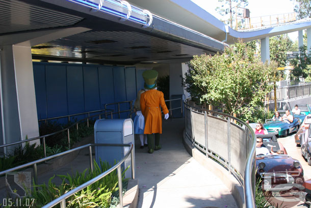 Time for a monorail ride, notice who is in front of me.. the Mad Hatter and Alice walked up to the platform, took some pictures with guests, then left