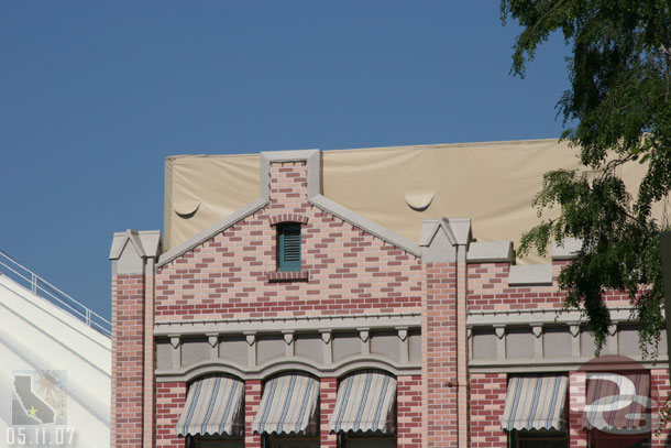 The tarps on the roof of the Mad Hatter are still there too