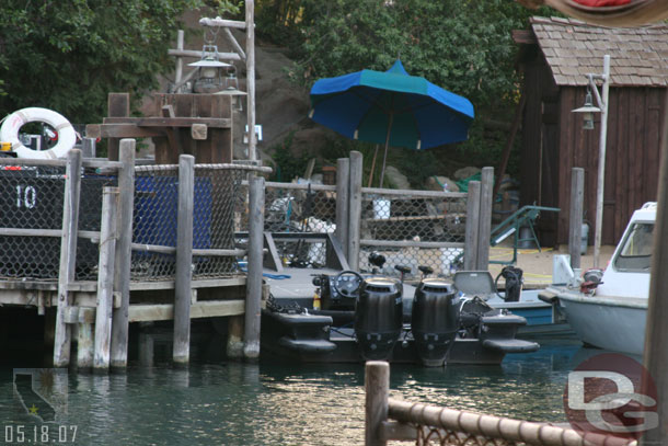 I did not notice this small boat earlier.. those are some large motors for the small Rivers of America