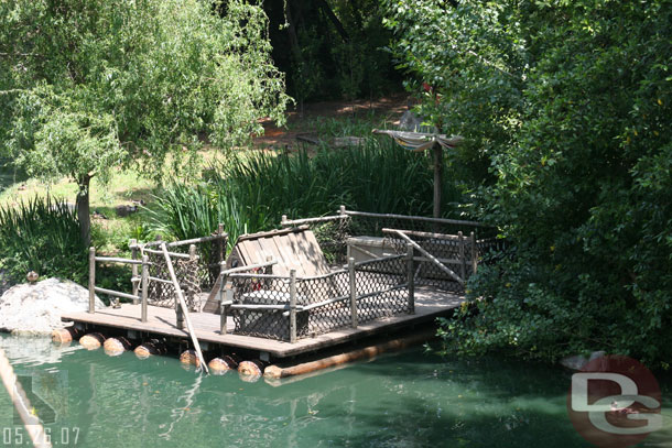 A raft docked out by the cabin