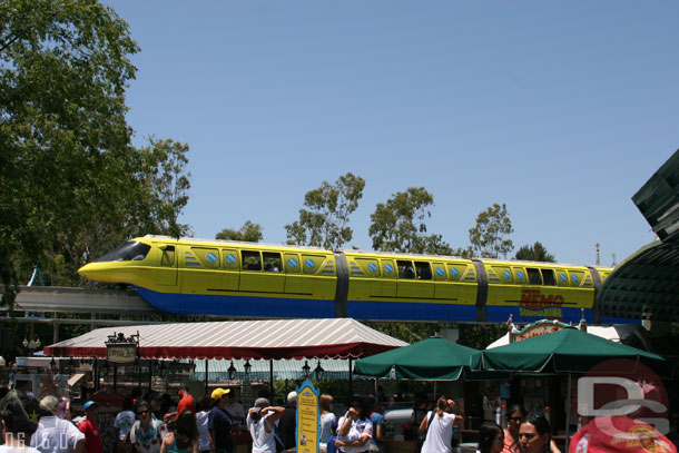 One of the monorails (I am guessing its Red since Purple was running) is wrapped with a Nemo overlay