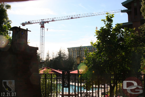 The crane towers over the pool