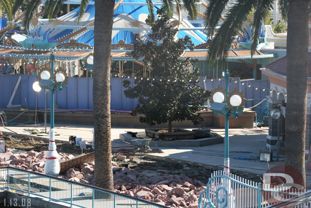 A look at the area in front of Toy Story Mania, I was wrong in my guess that is a planter (as is now obvious with the tree in there).